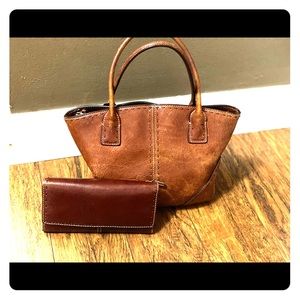Fossil saddle leather bag and wallet.